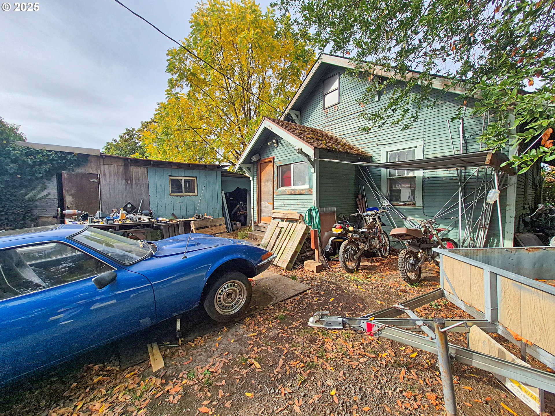 617 G Street Springfield, OR 97477 - Photo 24 of 26 a car parked in front of house