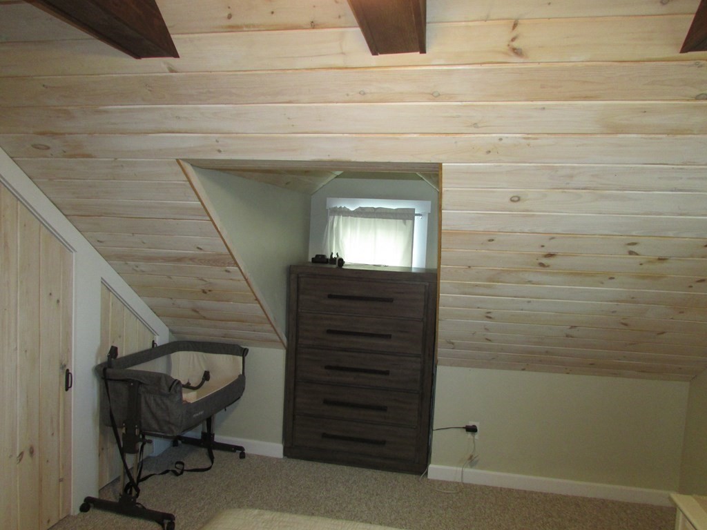 315 Hartwick Street Springfield, MA 01108 - Photo 26 of 40 a view of a hallway with wooden floor and staircase