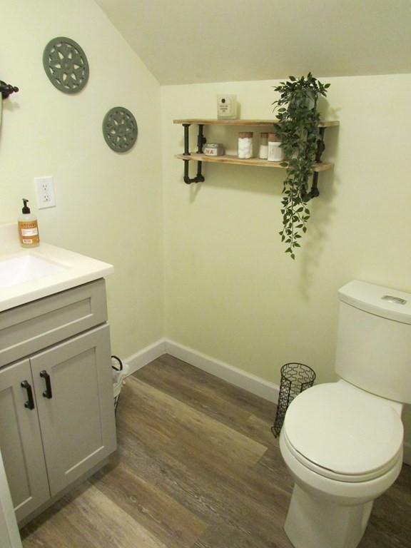 315 Hartwick Street Springfield, MA 01108 - Photo 32 of 40 a bathroom with a toilet and a sink