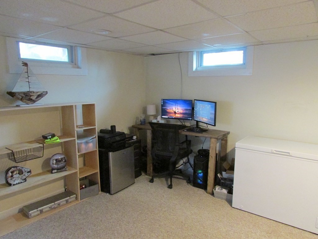 315 Hartwick Street Springfield, MA 01108 - Photo 38 of 40 a room with furniture and a flat screen tv