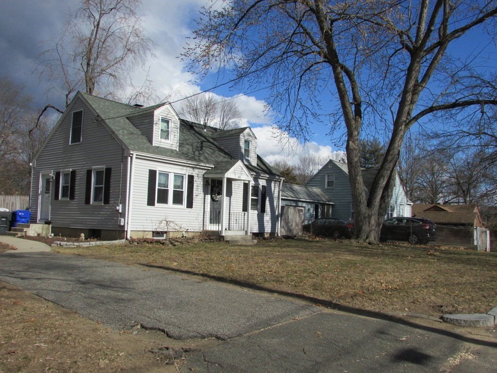 315 Hartwick Street Springfield, MA 01108 - Photo 6 of 40 a view of a house with a yard