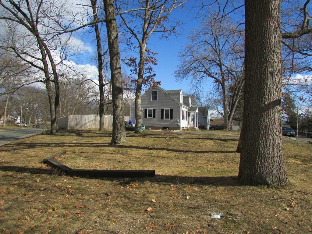 315 Hartwick Street Springfield, MA 01108 - Photo 7 of 40 a view of a house with a yard