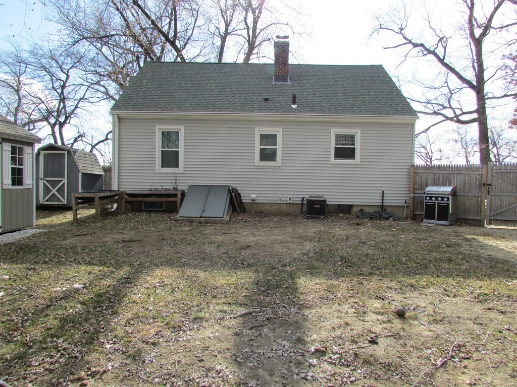 315 Hartwick Street Springfield, MA 01108 - Photo 8 of 40 a view of a house with a yard