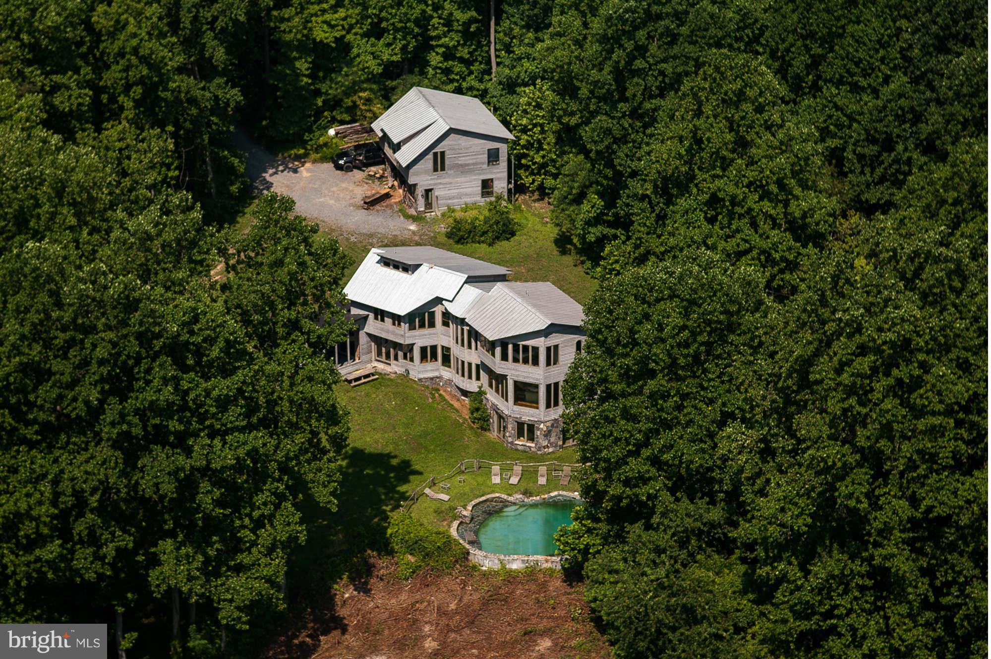 347 Fairhaven Road Tracys Landing, MD 20779 - Photo 4 of 26 a aerial view of a house with a yard basket ball court and outdoor seating