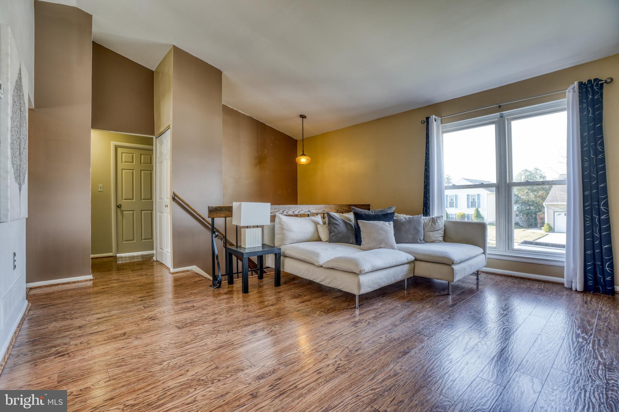 9013 Moonstone Road Nottingham, MD 21236 - Photo 2 of 39 Living room features new flooring