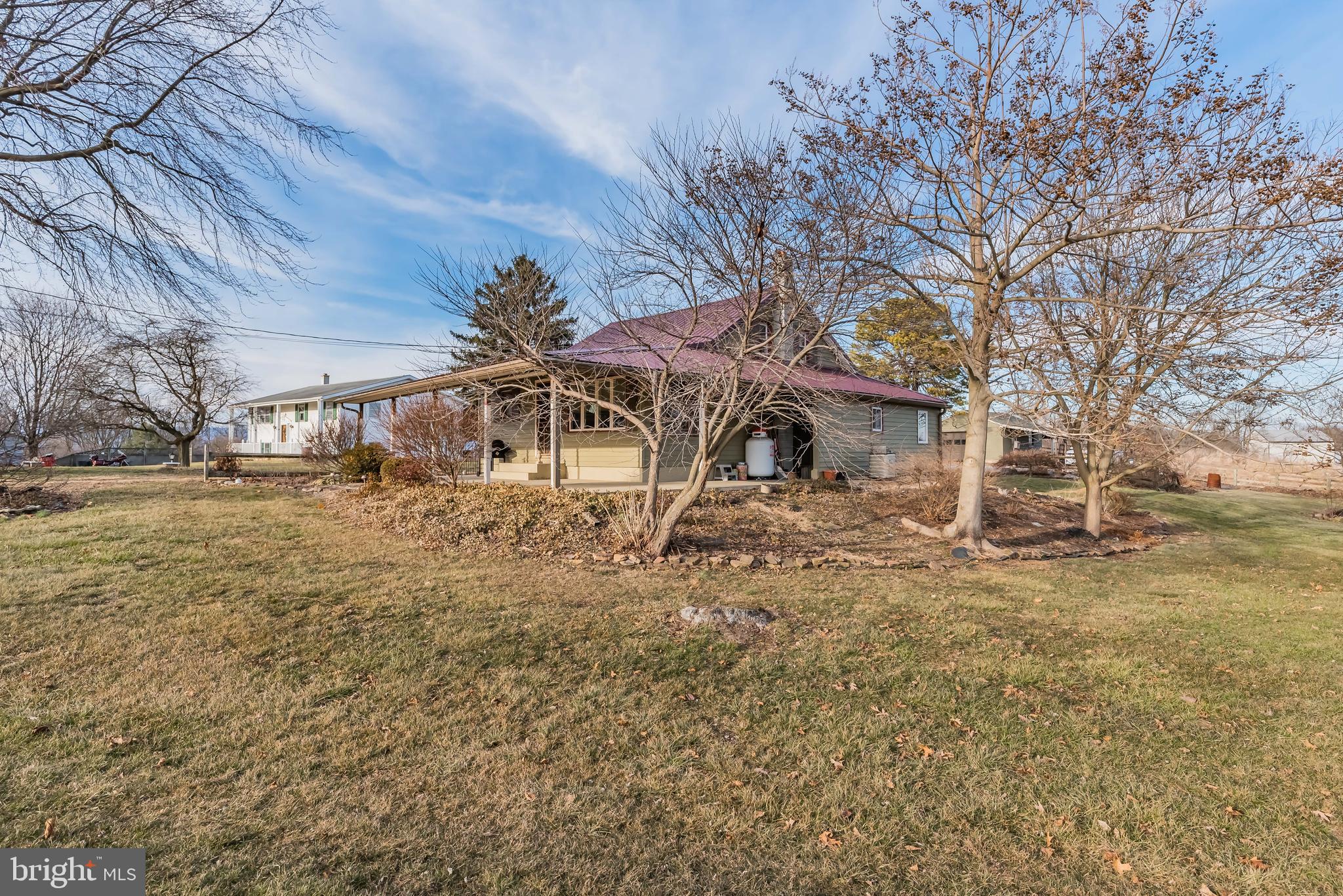 111 Clay Road Carlisle, PA 17015 - Photo 4 of 42 Extra deep covered front patio extends around side