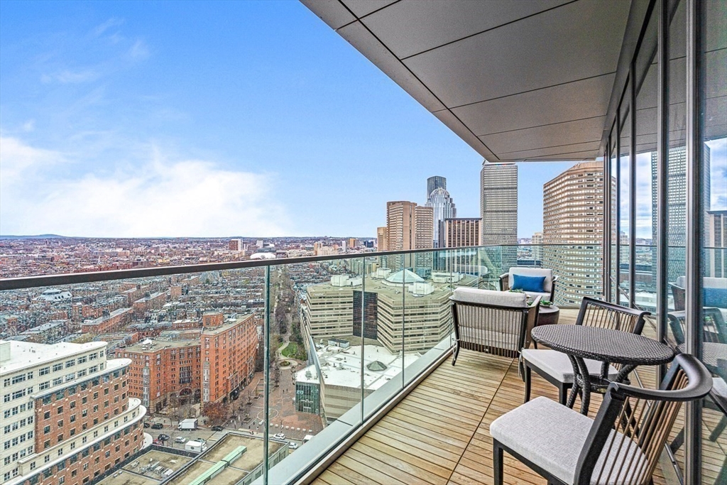 40 Trinity Place, Unit 32A Boston, MA 02116 - Photo 11 of 32 a view of a balcony with chairs
