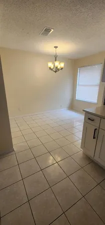 a view of a livingroom with furniture