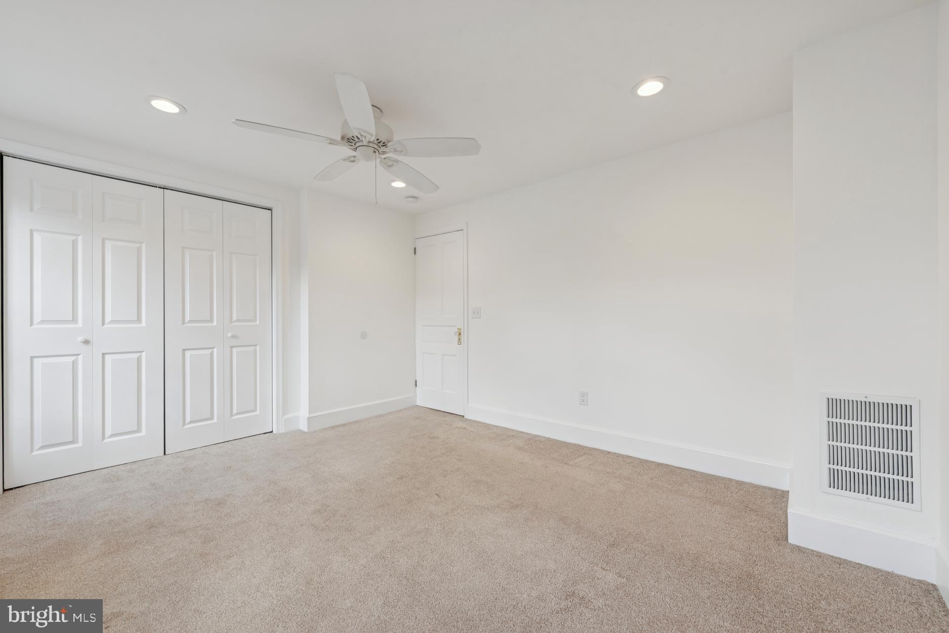 92 Embreeville Road Downingtown, PA 19335 - Photo 14 of 30 an empty room with a ceiling fan and window