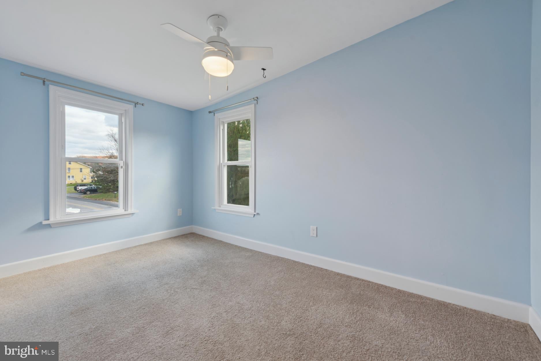 92 Embreeville Road Downingtown, PA 19335 - Photo 18 of 30 an empty room with windows and fan