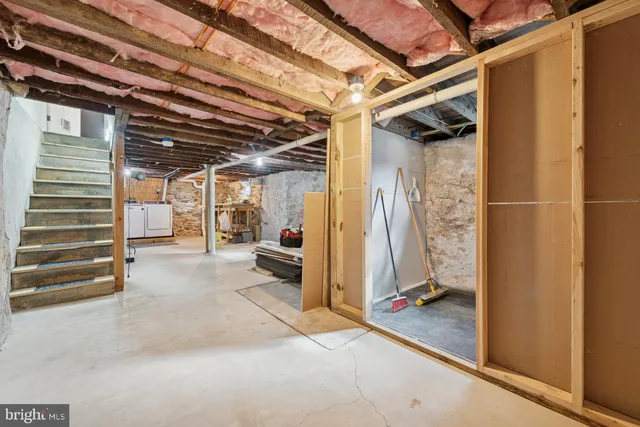 a picture of a bench in a white building