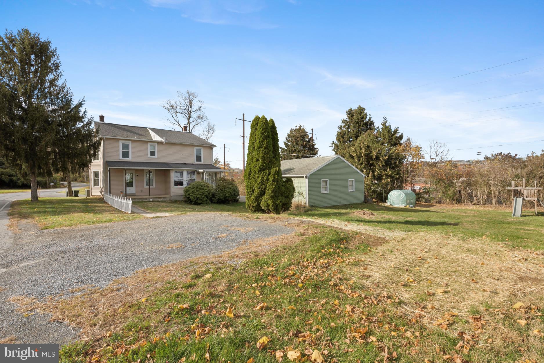92 Embreeville Road Downingtown, PA 19335 - Photo 25 of 30 a front view of a house with a yard