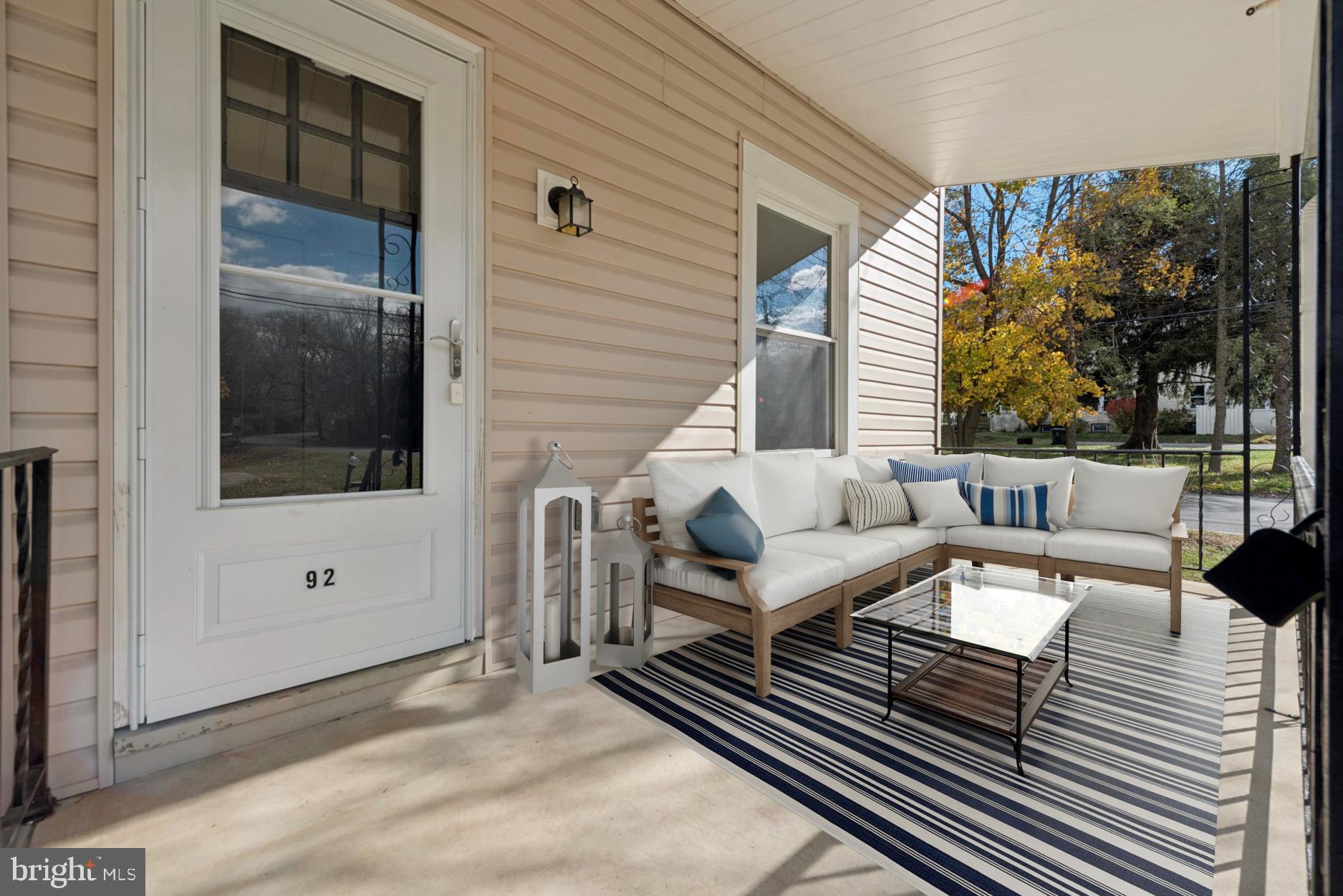 92 Embreeville Road Downingtown, PA 19335 - Photo 3 of 30 a balcony with furniture and a potted plant