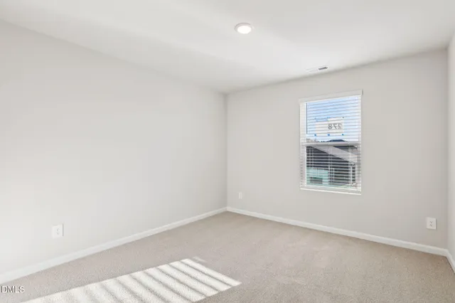 a bathroom with a tub sink vanity and a mirror