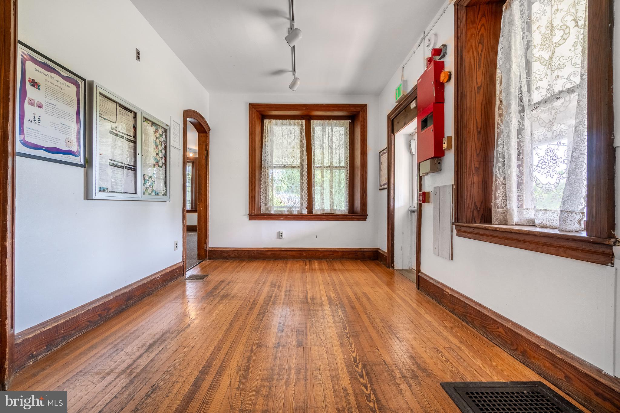 0 Devereux Road Glenmoore, PA 19343 - Photo 15 of 33 a view of an empty room with wooden floor and a window
