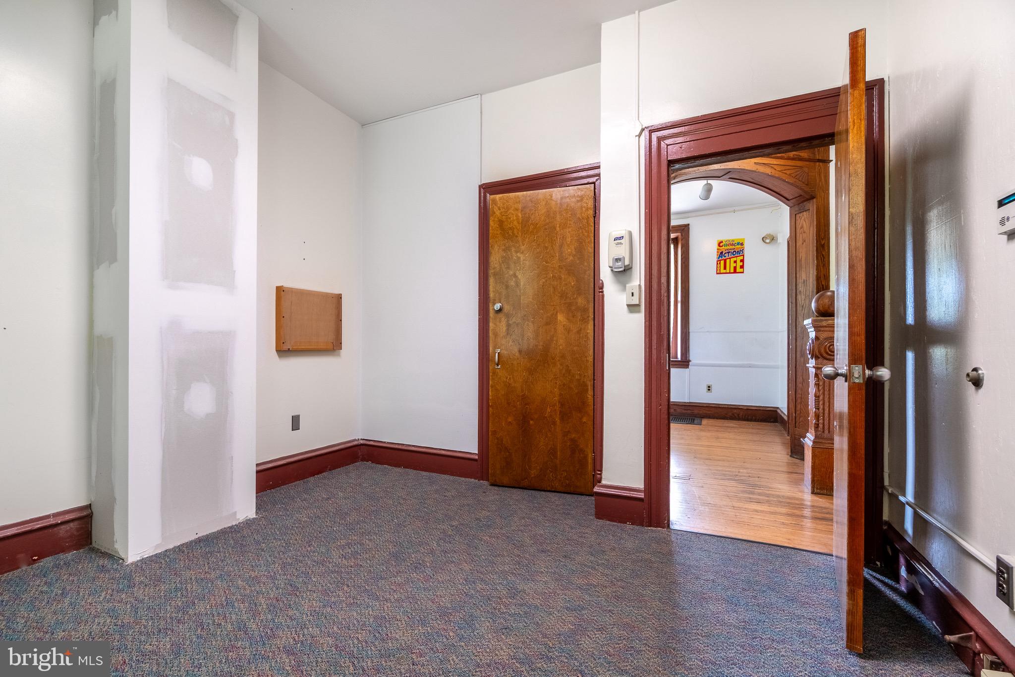 0 Devereux Road Glenmoore, PA 19343 - Photo 31 of 33 an empty room and wooden door