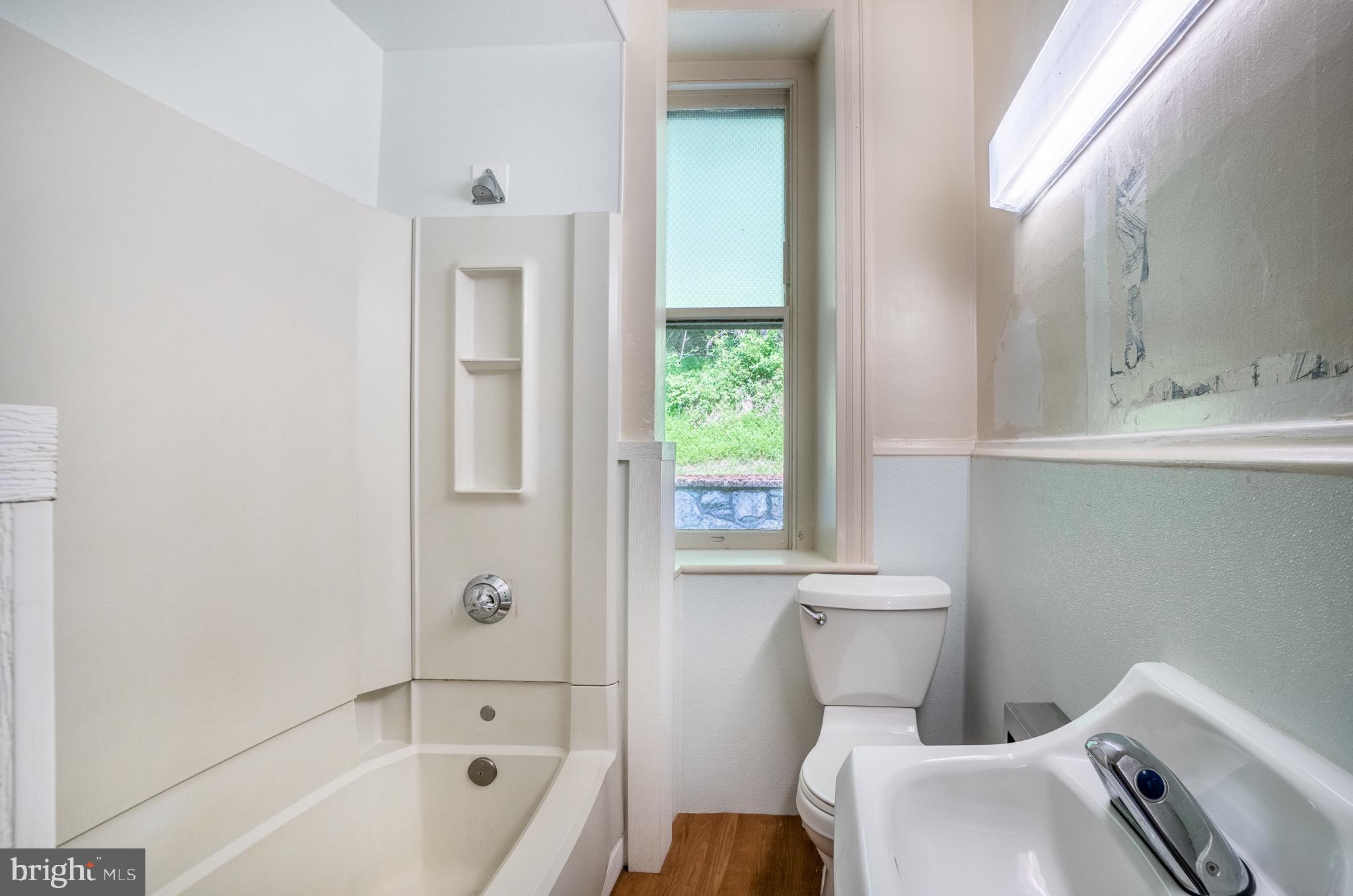 0 Devereux Road Glenmoore, PA 19343 - Photo 32 of 33 a bathroom with a sink a toilet and bathtub
