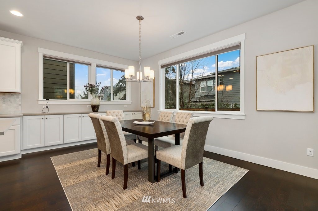 4327 223rd Place Southeast Bothell, WA 98021 - Photo 14 of 40 a view of a dining room with furniture window and outside view