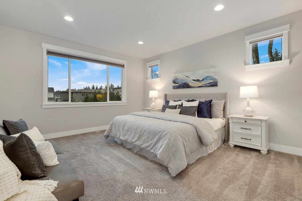 4327 223rd Place Southeast Bothell, WA 98021 - Photo 21 of 40 a bedroom with a bed and window