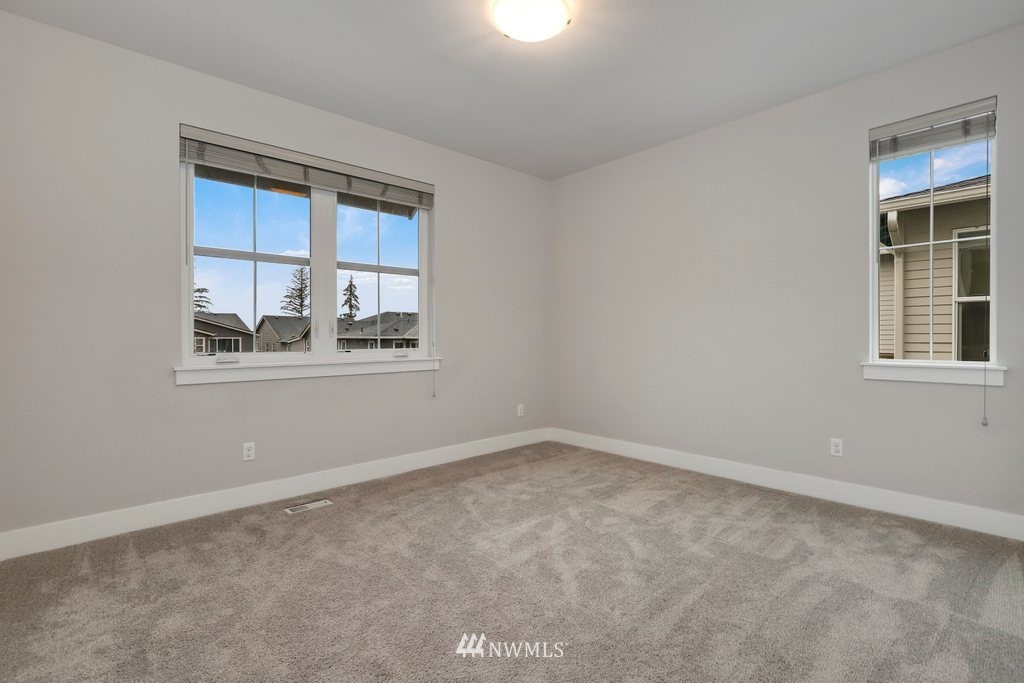 4327 223rd Place Southeast Bothell, WA 98021 - Photo 26 of 40 a view of an empty room with a window