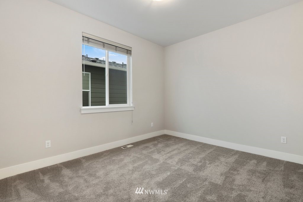 4327 223rd Place Southeast Bothell, WA 98021 - Photo 29 of 40 an empty room with a window