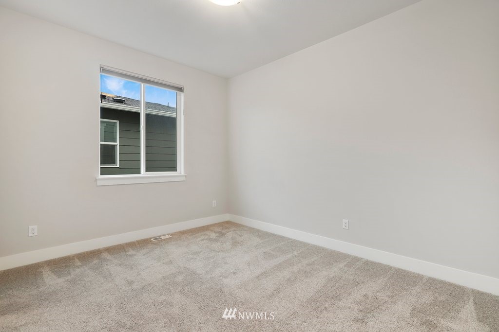 4327 223rd Place Southeast Bothell, WA 98021 - Photo 30 of 40 an empty room with a window