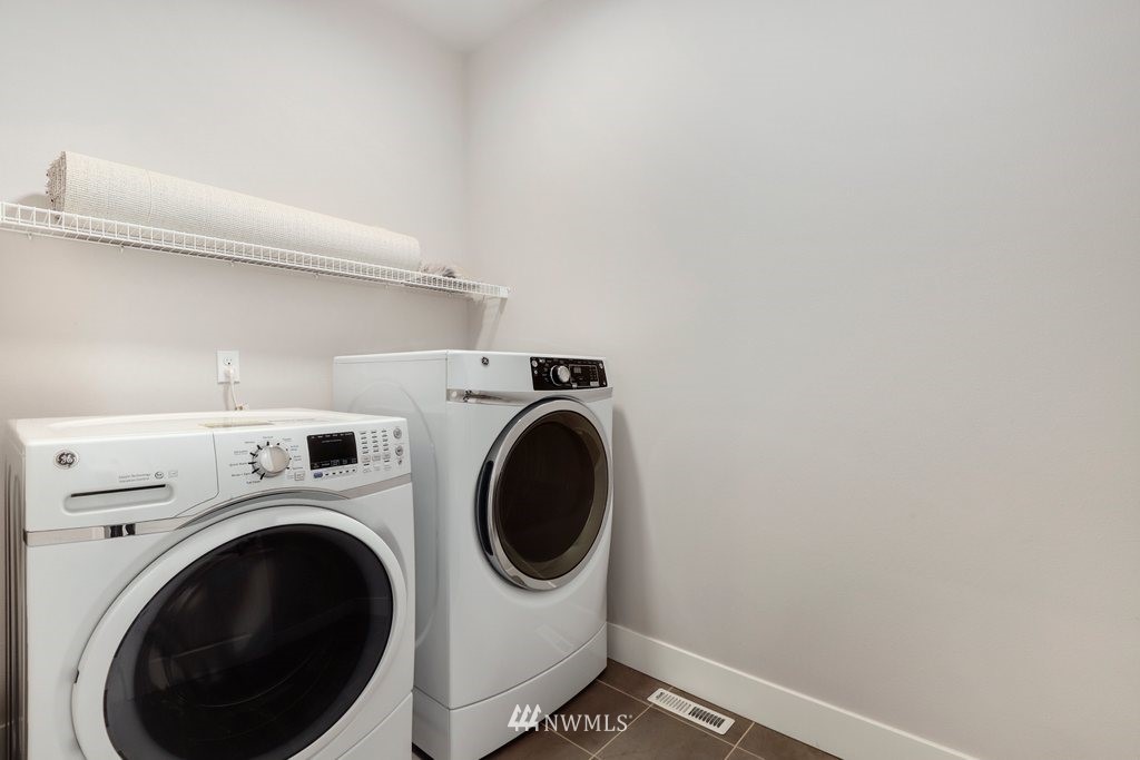 4327 223rd Place Southeast Bothell, WA 98021 - Photo 33 of 40 a utility room with dryer and washer