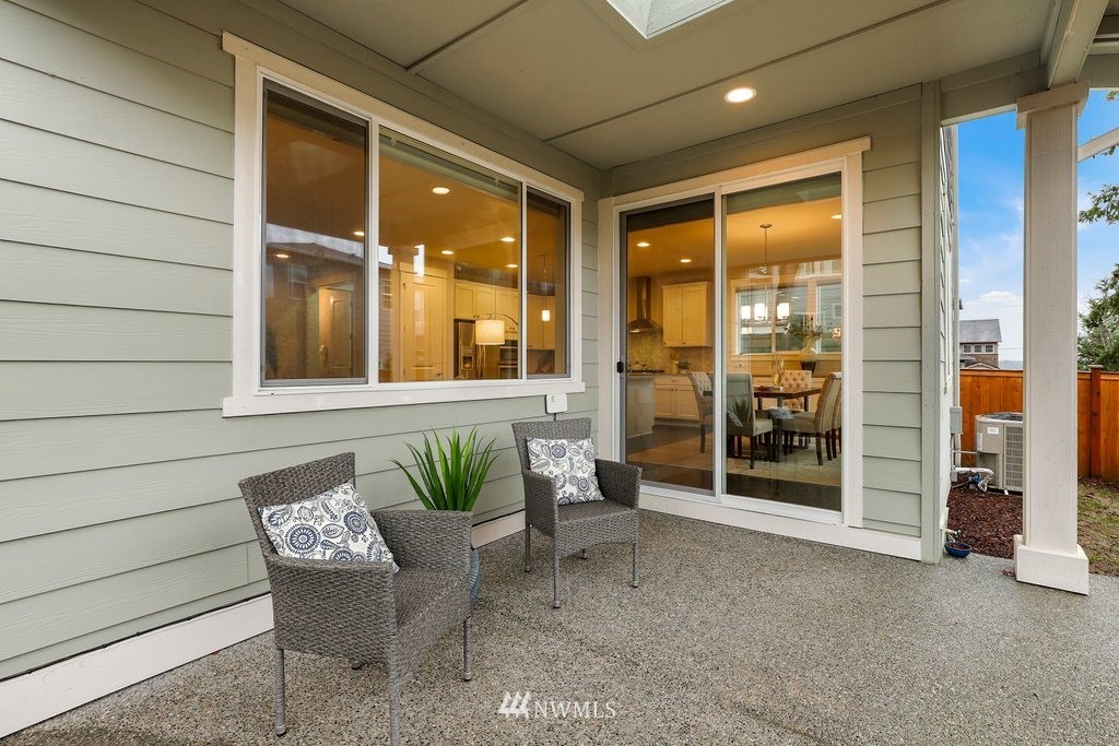 4327 223rd Place Southeast Bothell, WA 98021 - Photo 34 of 40 a view of a balcony with chair and table