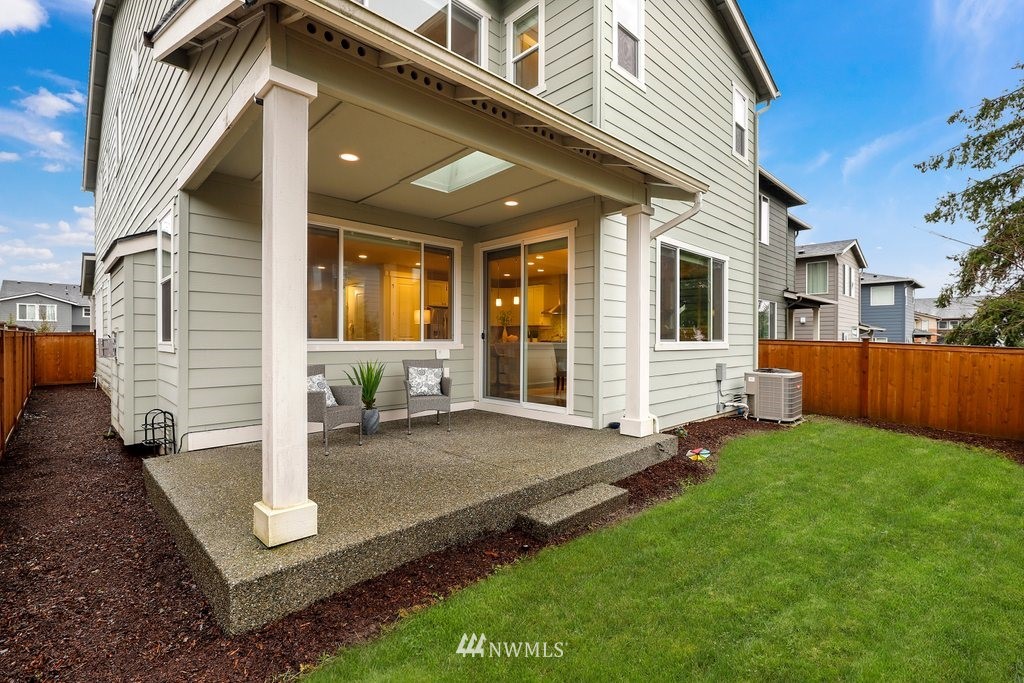 4327 223rd Place Southeast Bothell, WA 98021 - Photo 36 of 40 a front view of a house with a yard