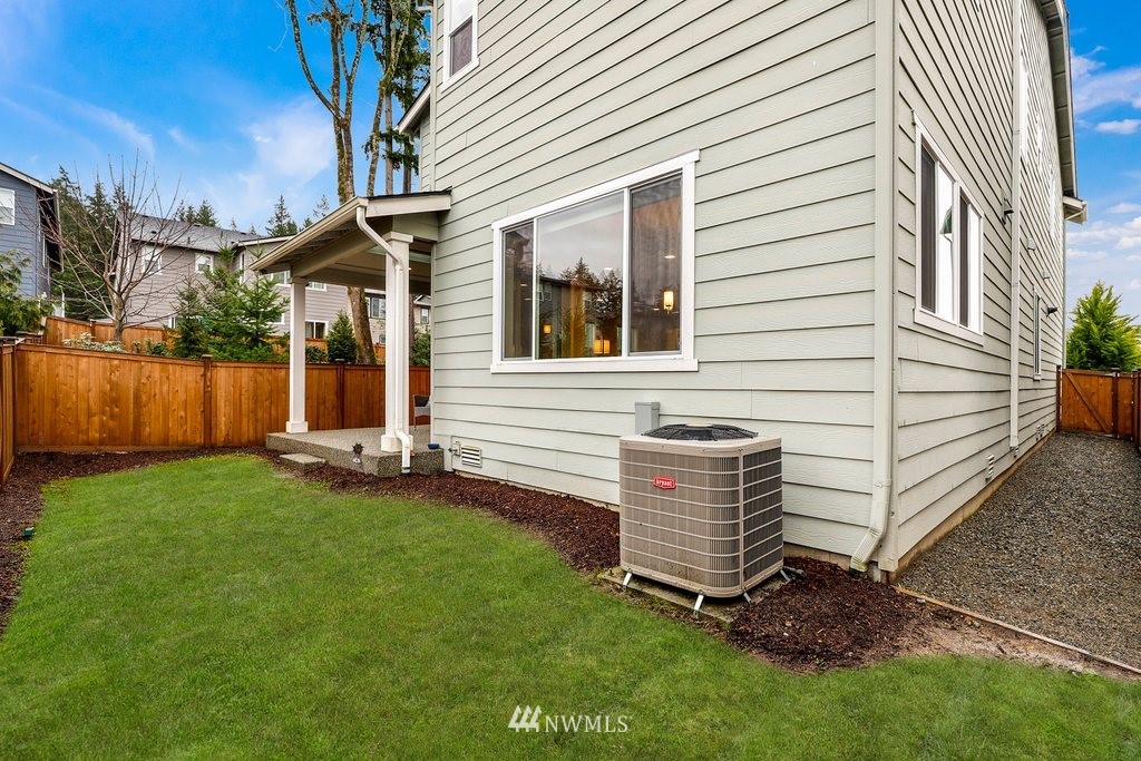4327 223rd Place Southeast Bothell, WA 98021 - Photo 37 of 40 a view of a house with a yard