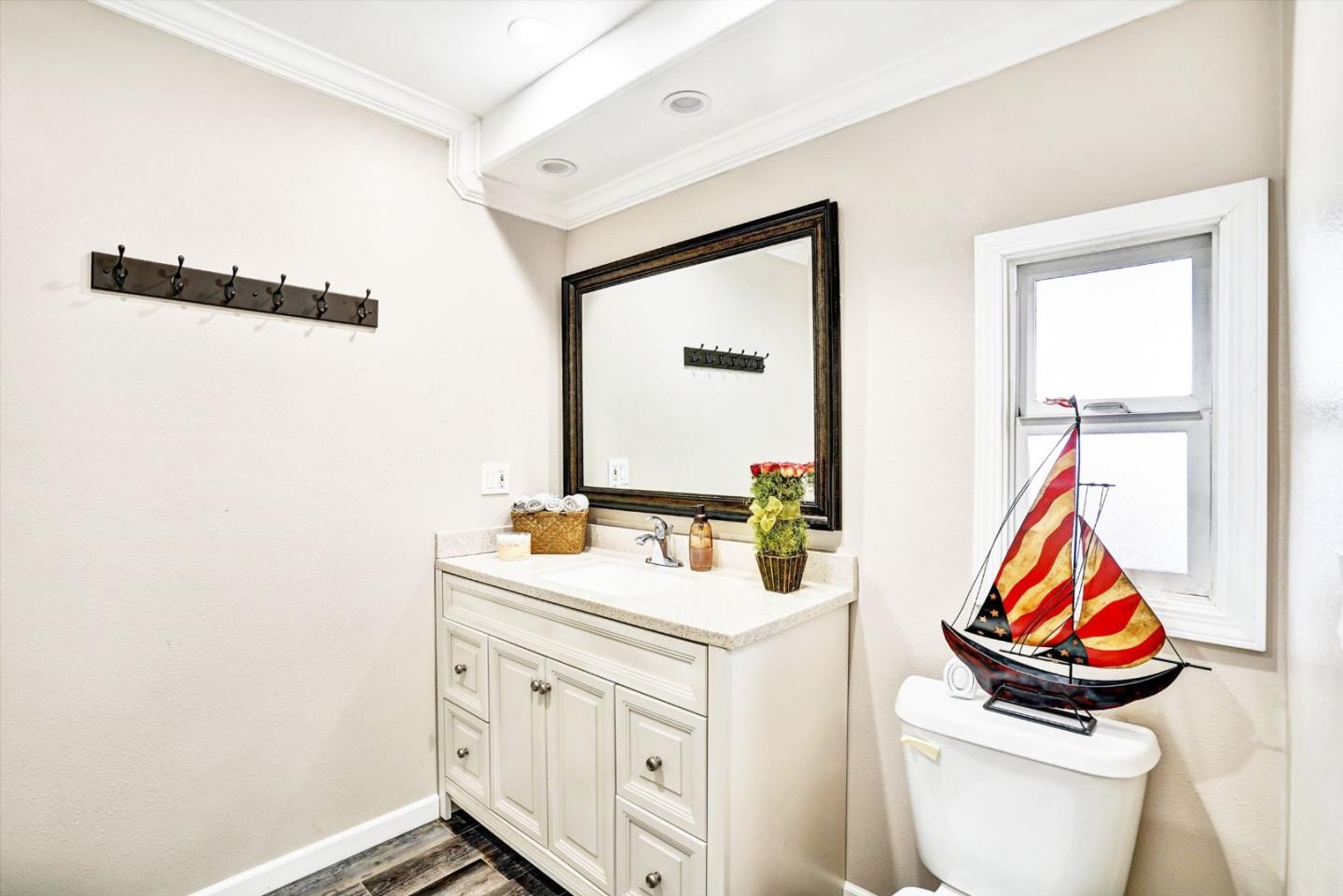 15820 South Harlan Road, Unit 22 Lathrop, CA 95330 - Photo 11 of 18 a bathroom with a sink and a toilet