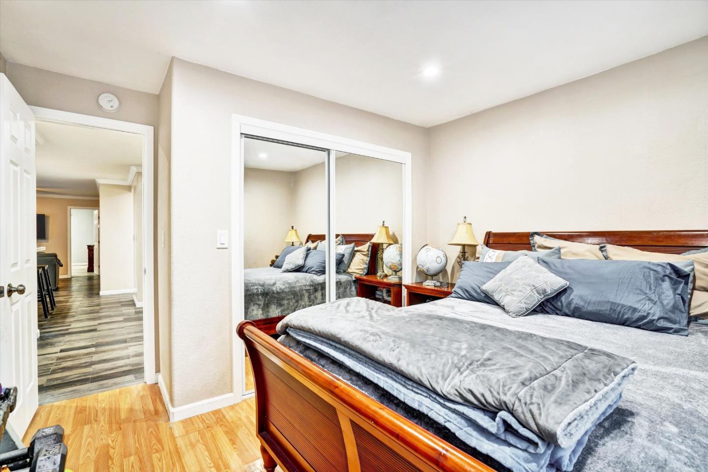 15820 South Harlan Road, Unit 22 Lathrop, CA 95330 - Photo 14 of 18 a bedroom with two beds and a couch