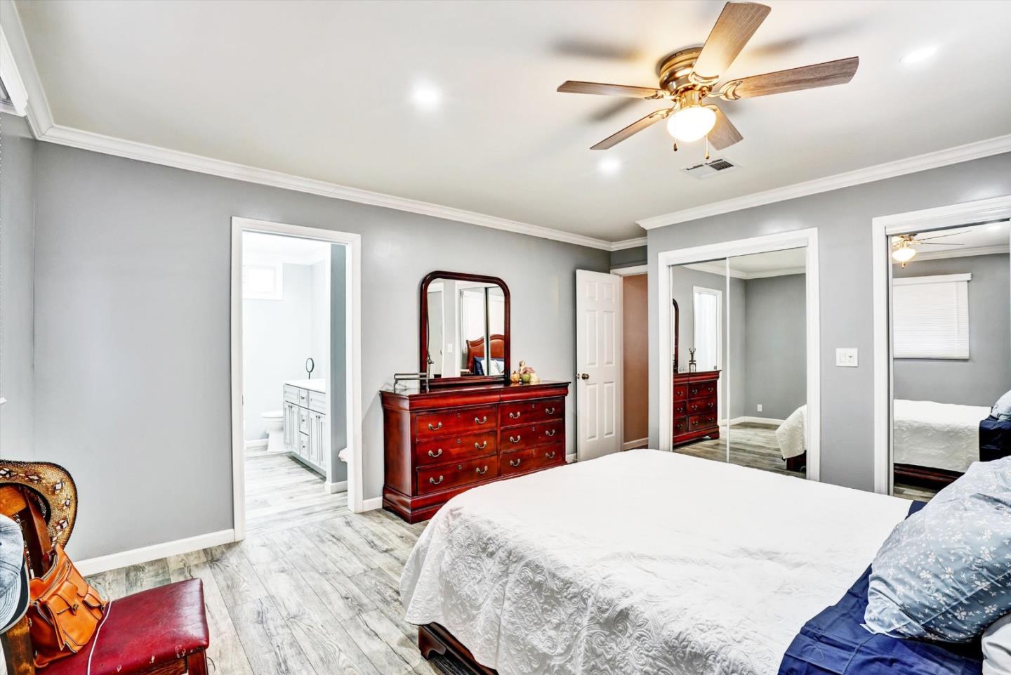 15820 South Harlan Road, Unit 22 Lathrop, CA 95330 - Photo 16 of 18 a bedroom with a bed and a dresser