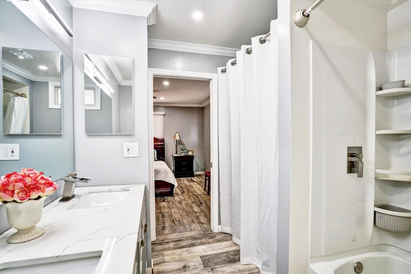 15820 South Harlan Road, Unit 22 Lathrop, CA 95330 - Photo 18 of 18 a bathroom with a sink toilet and shower