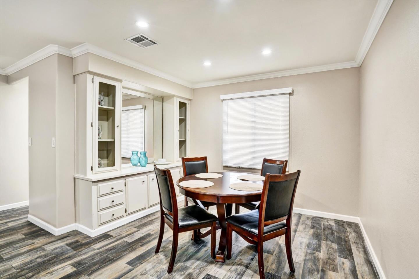 15820 South Harlan Road, Unit 22 Lathrop, CA 95330 - Photo 10 of 18 a view of a dining room with furniture and window