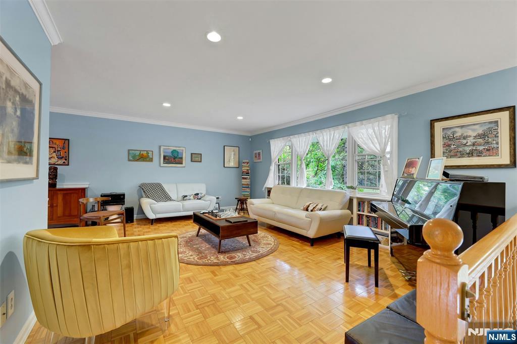 1093 Sheridan Street New Milford, NJ 07646 - Photo 26 of 45 a living room with furniture and a window