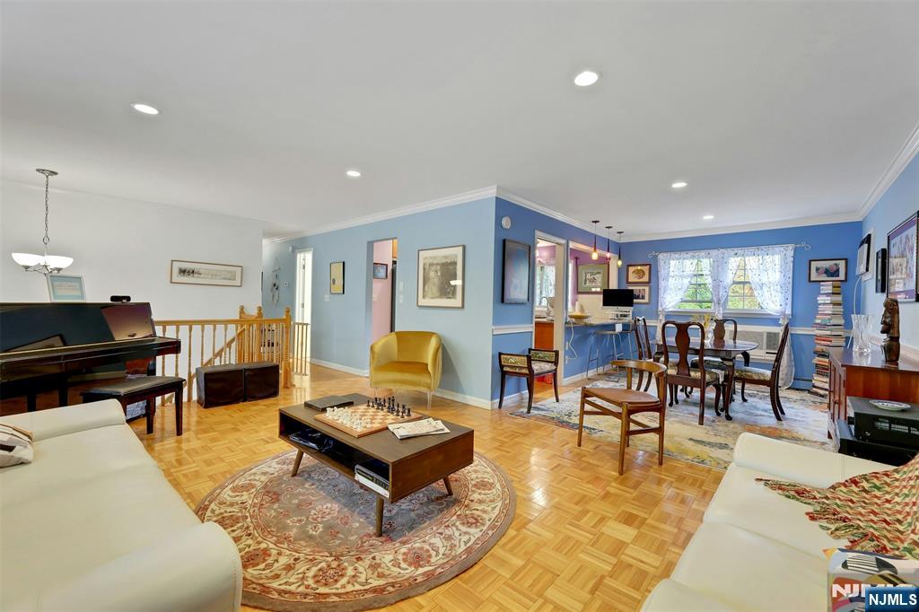 1093 Sheridan Street New Milford, NJ 07646 - Photo 27 of 45 a living room with furniture and a table