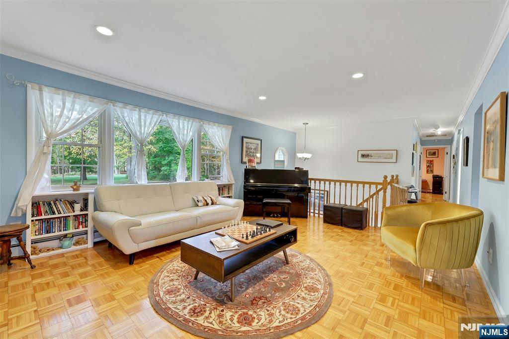 1093 Sheridan Street New Milford, NJ 07646 - Photo 29 of 45 a living room with furniture and a large window