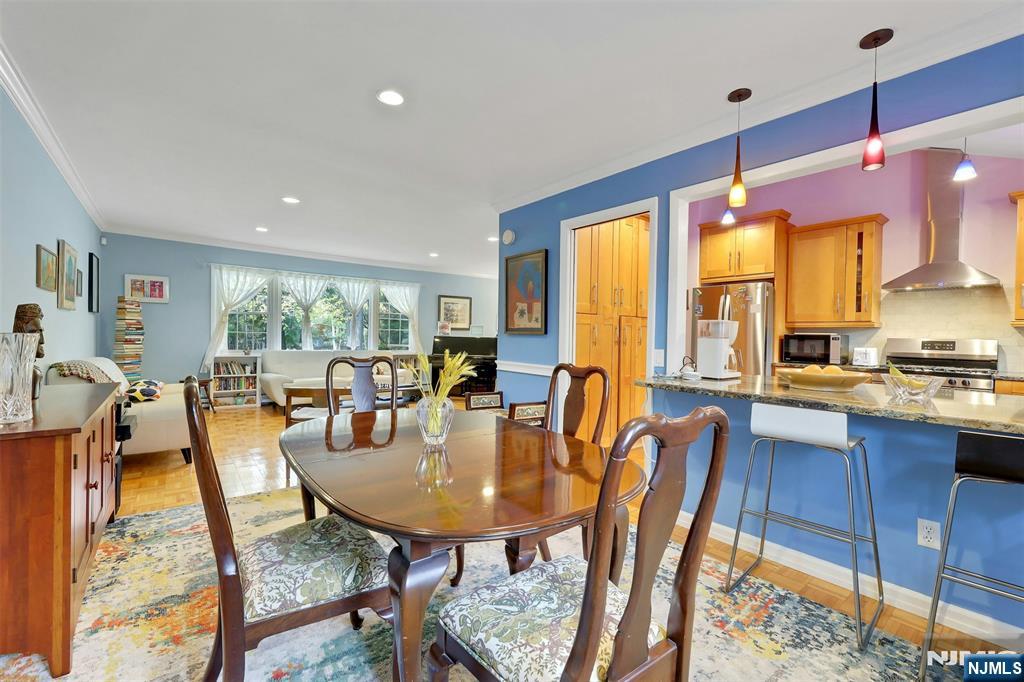 1093 Sheridan Street New Milford, NJ 07646 - Photo 30 of 45 a view of a dining room with furniture window and wooden floor