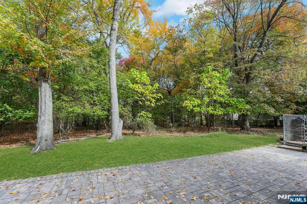 1093 Sheridan Street New Milford, NJ 07646 - Photo 8 of 45 a view of a park with large trees