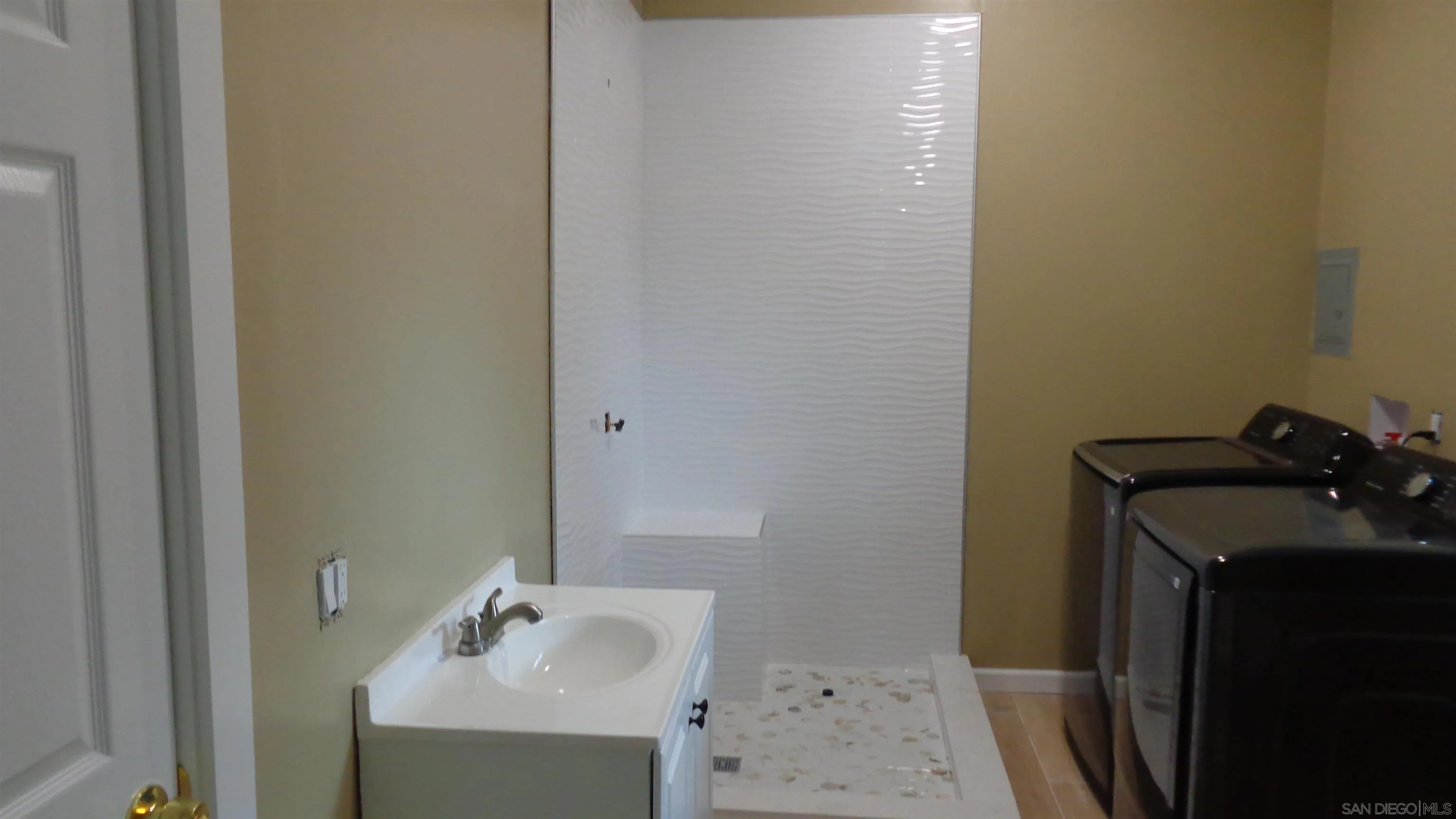 29660 Wilkes Road Valley Center, CA 92082 - Photo 15 of 16 a bathroom with a sink and a toilet