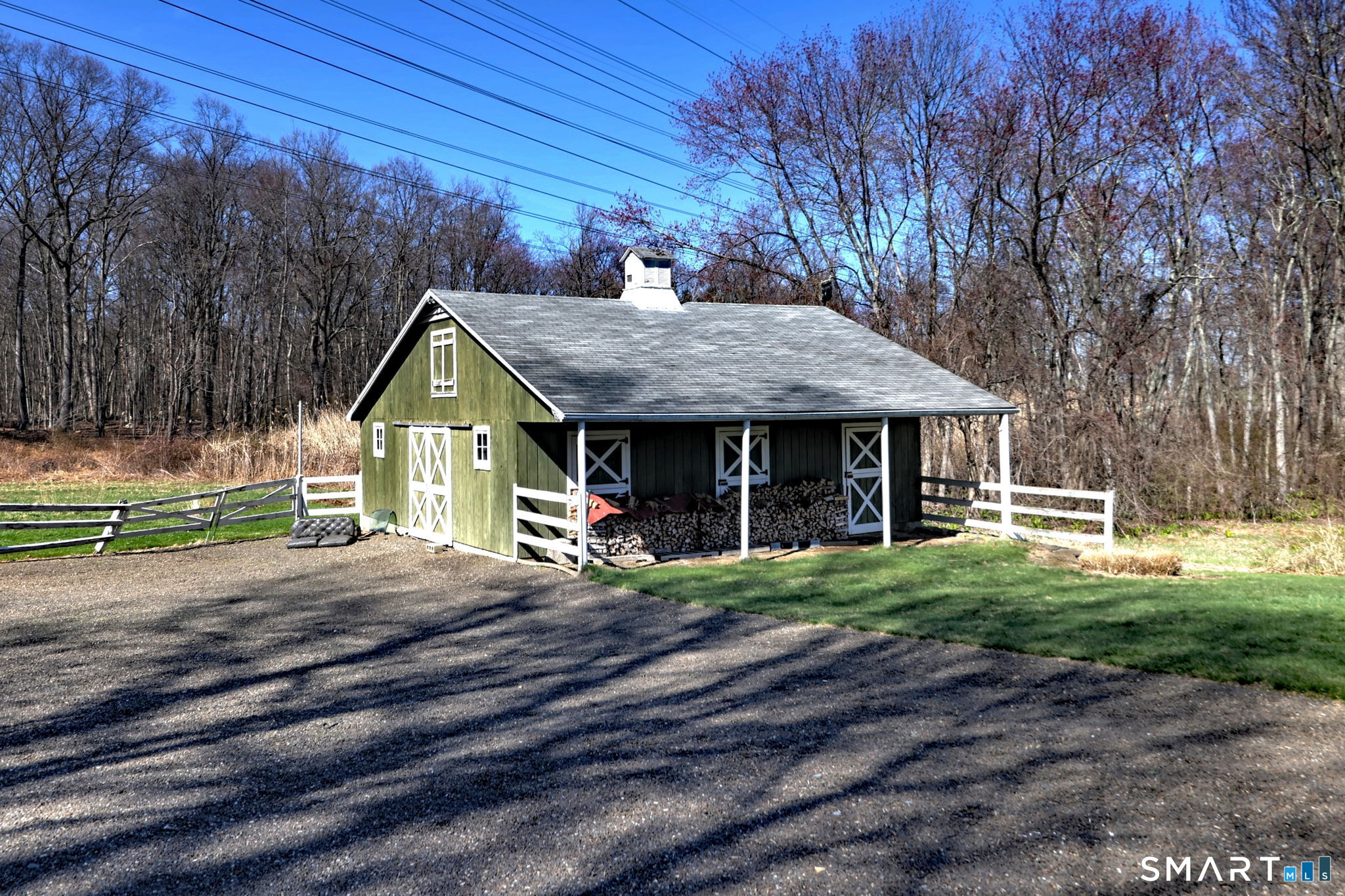 55 East Rutland Road Milford, CT 06461 - Photo 3 of 20 a view of a house with a yard and tree s