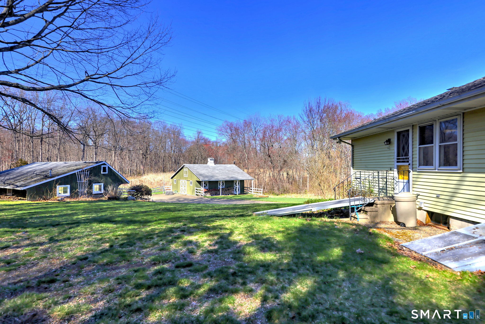 55 East Rutland Road Milford, CT 06461 - Photo 4 of 20 a view of a house with a yard