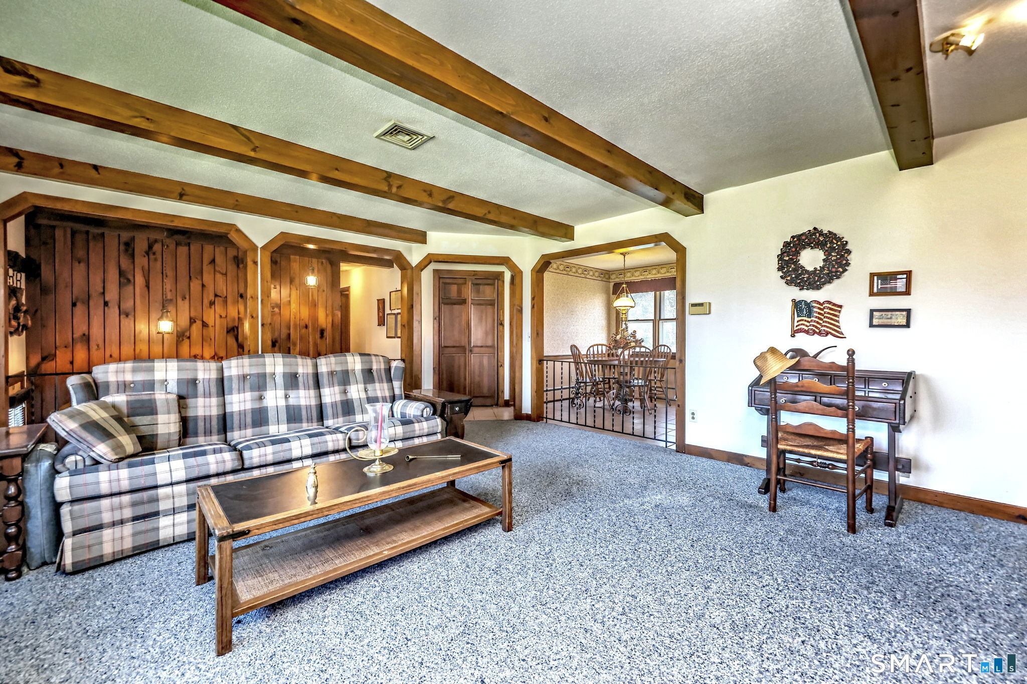 55 East Rutland Road Milford, CT 06461 - Photo 6 of 20 a reading room with furniture and a rug