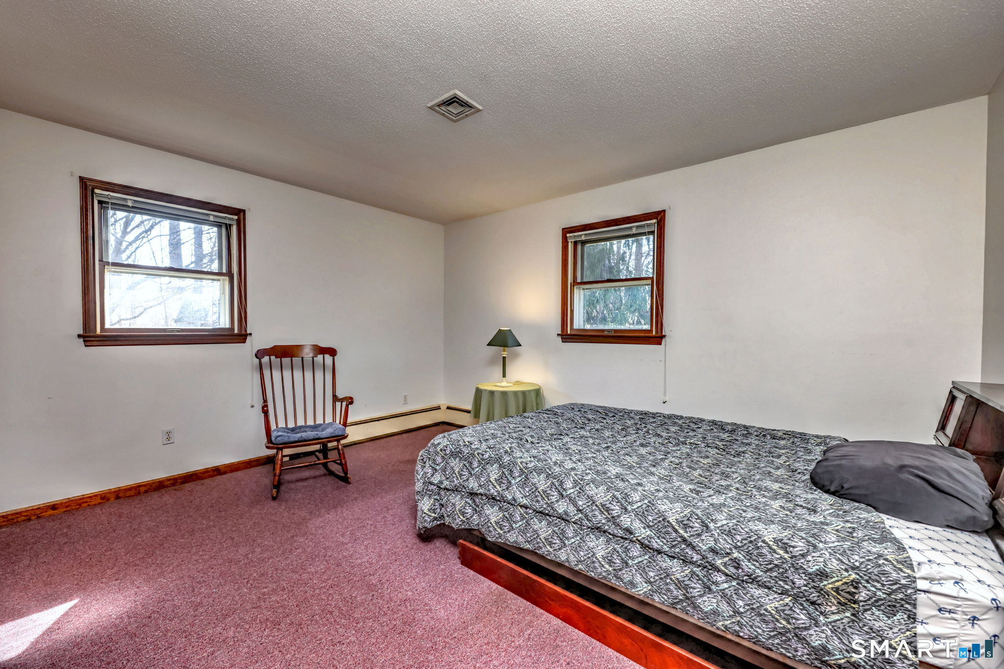 55 East Rutland Road Milford, CT 06461 - Photo 10 of 20 a bedroom with a bed and a window