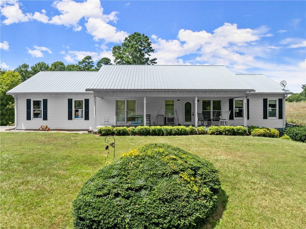 front view of a house with a yard