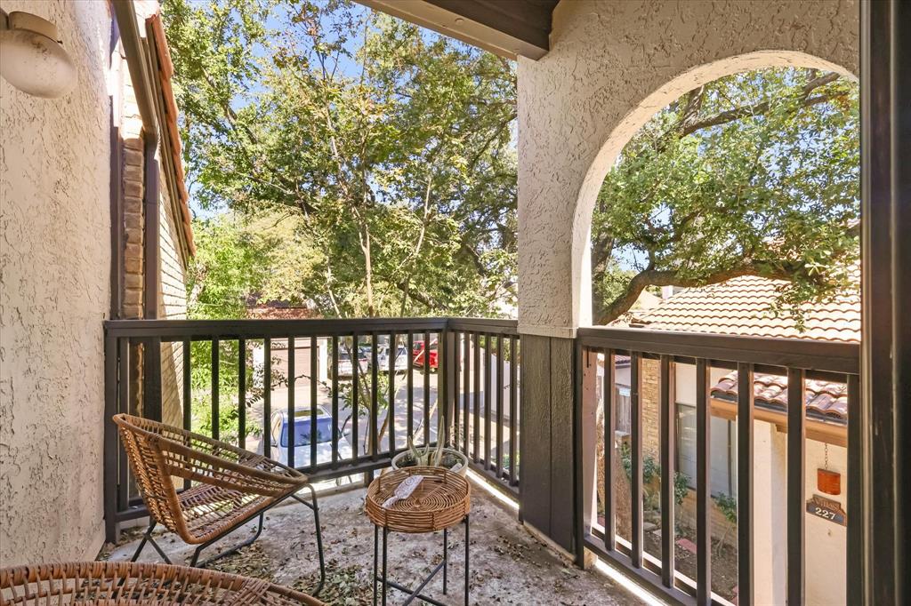 18040 Midway Road, Unit 225 Dallas, TX 75287 - Photo 15 of 24 a view of a chairs in balcony