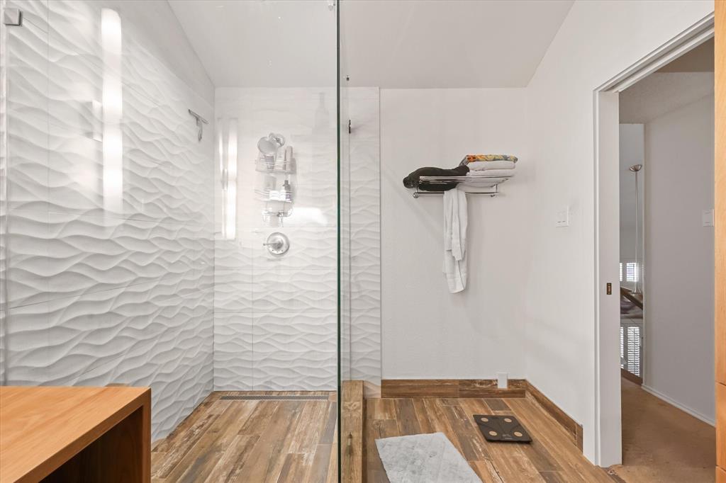 18040 Midway Road, Unit 225 Dallas, TX 75287 - Photo 17 of 24 a bathroom with a shower