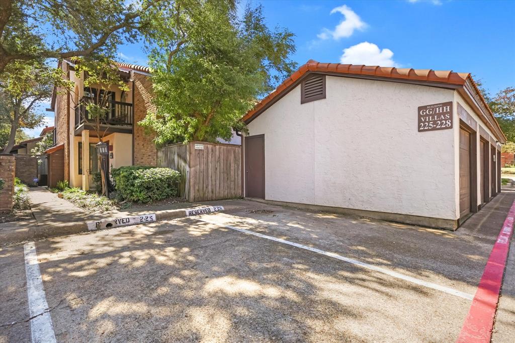 18040 Midway Road, Unit 225 Dallas, TX 75287 - Photo 19 of 24 a view of a house with a yard