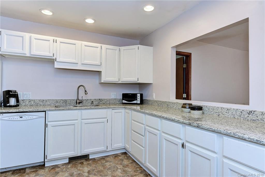 2400 High Ridge Road Charlotte, NC 28270 - Photo 22 of 33 a kitchen with sink cabinets and window